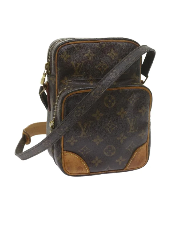 Monogram Canvas Shoulder Bag with Adjustable Strap and Multiple Pockets