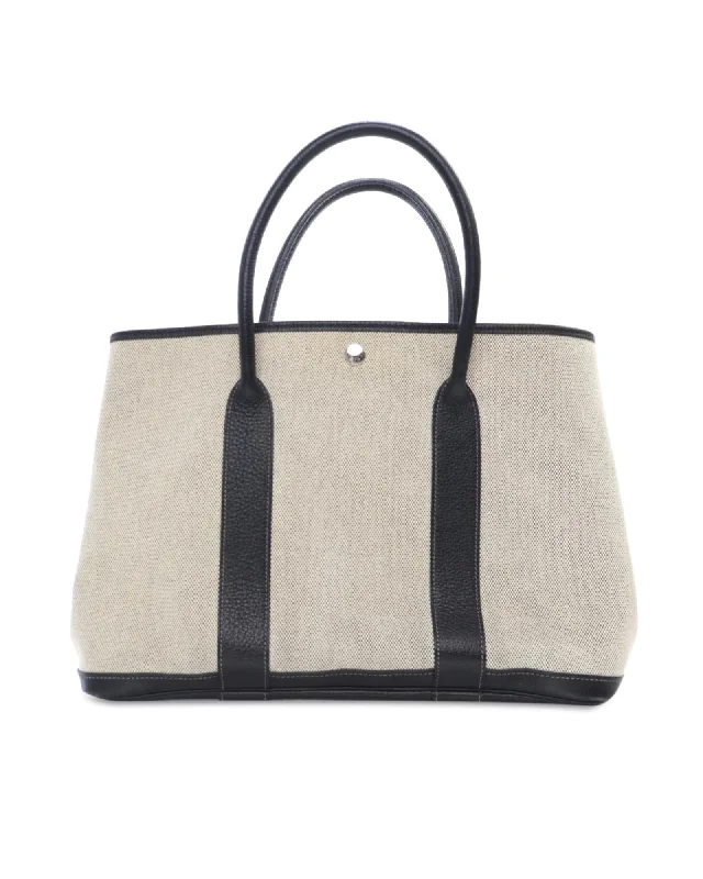 Canvas Tote Bag with Textured Leather Trim and Snap Button Closure